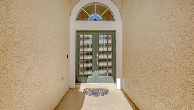 a view of a kitchen with a sink dishwasher and wooden floor