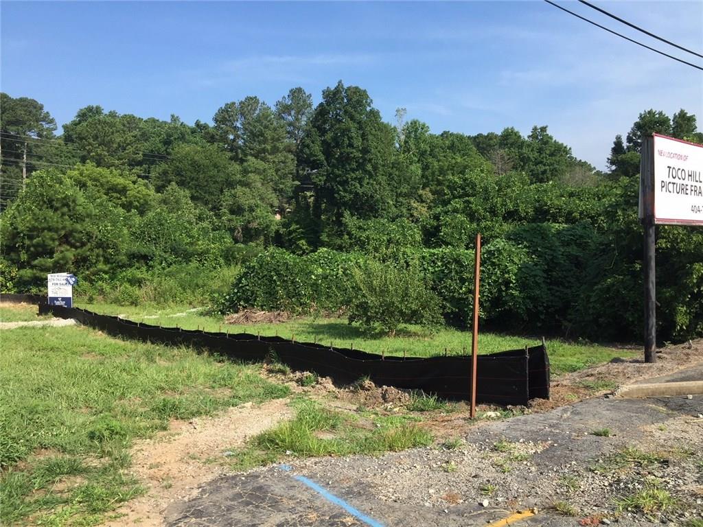3302 North Druid Hills Road Northeast Decatur, GA 30033 - Photo 1 of 1 a view of a lake with a yard