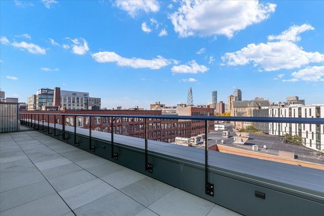 a view of a terrace with city view