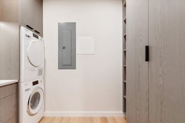a bathroom with a shower and a mirror
