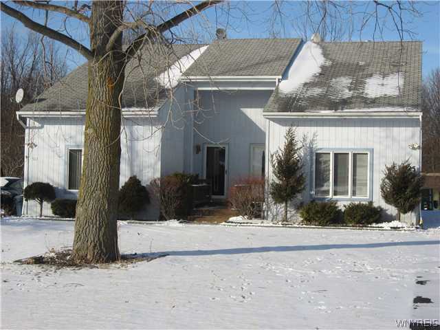 Exterior Front. Unit for sale is on the right side