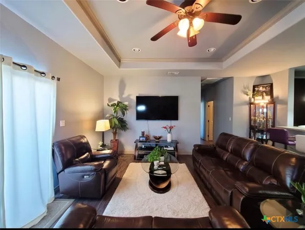 a kitchen with a granite countertop sink and a granite counter top