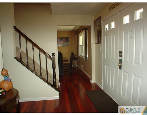 17 Sinclair Road Edison, NJ 08820 - Photo 11 of 11 a view interior of a house with wooden floor and stairs