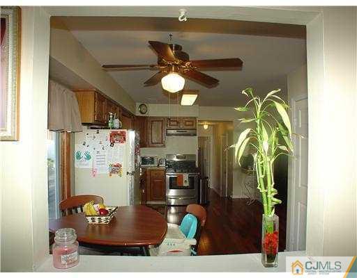 17 Sinclair Road Edison, NJ 08820 - Photo 3 of 11 a view of a dining room with furniture