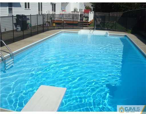 17 Sinclair Road Edison, NJ 08820 - Photo 10 of 11 a view of swimming pool with seating area