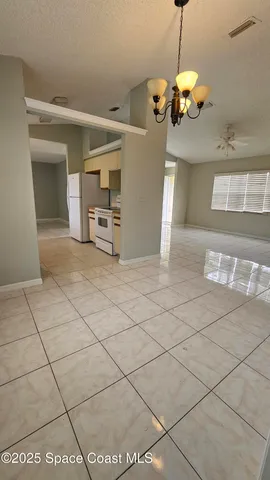 a view of a livingroom with a chandelier