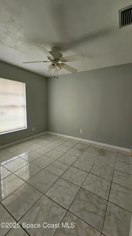 a bathroom with a toilet a sink and shower