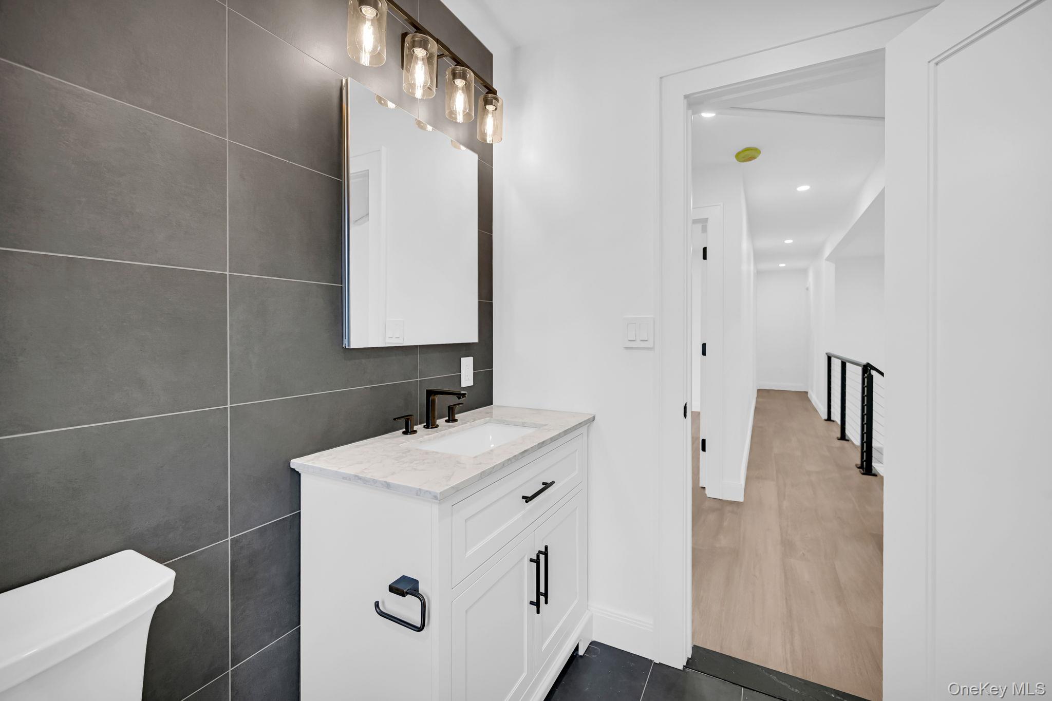 82 Seton Drive New Rochelle, NY 10804 - Photo 22 of 50 a bathroom with a sink toilet and shower