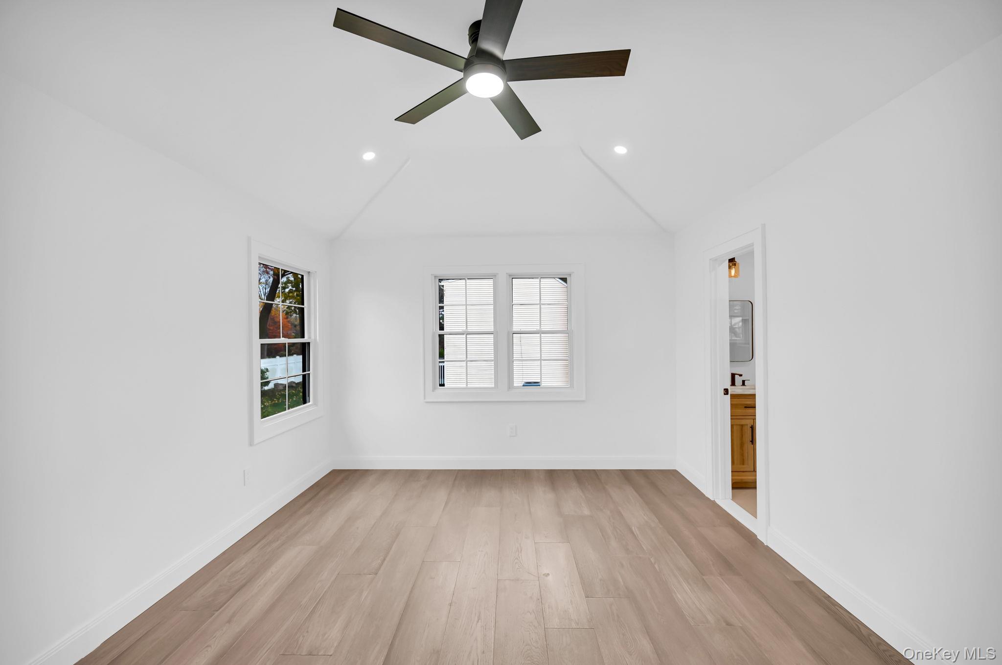 82 Seton Drive New Rochelle, NY 10804 - Photo 34 of 50 wooden floor in an empty room with a window