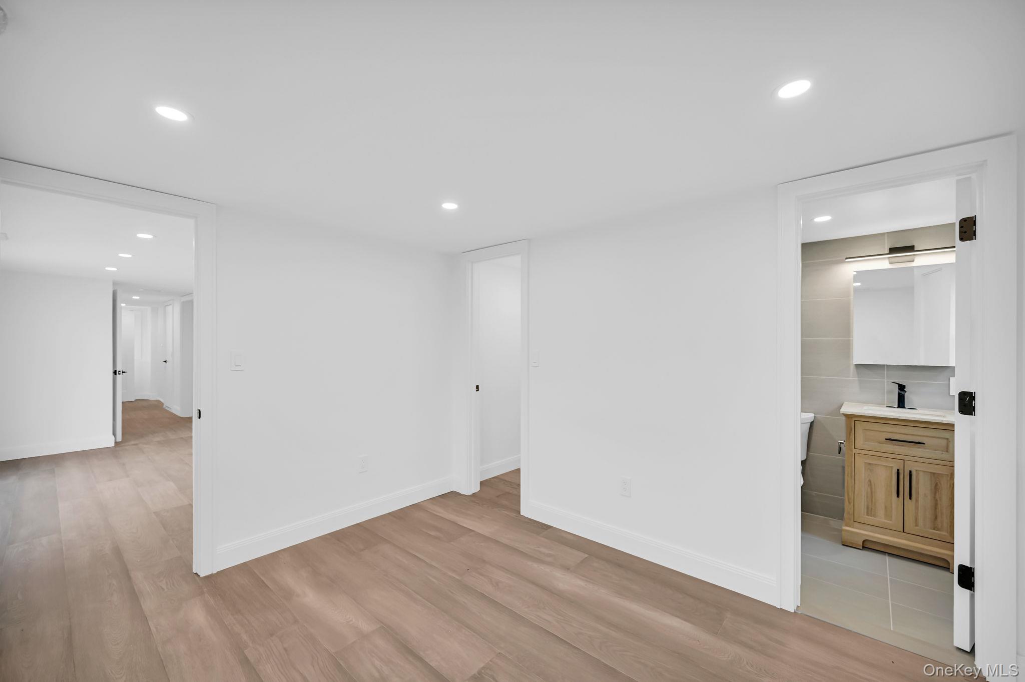 82 Seton Drive New Rochelle, NY 10804 - Photo 39 of 50 a view of a kitchen with a sink and a refrigerator