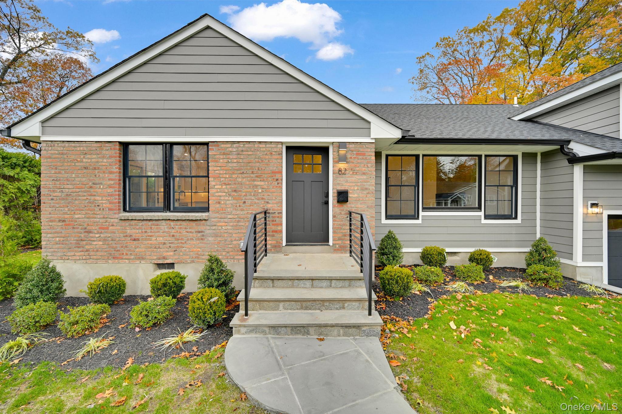 82 Seton Drive New Rochelle, NY 10804 - Photo 4 of 50 a front view of a house with garden