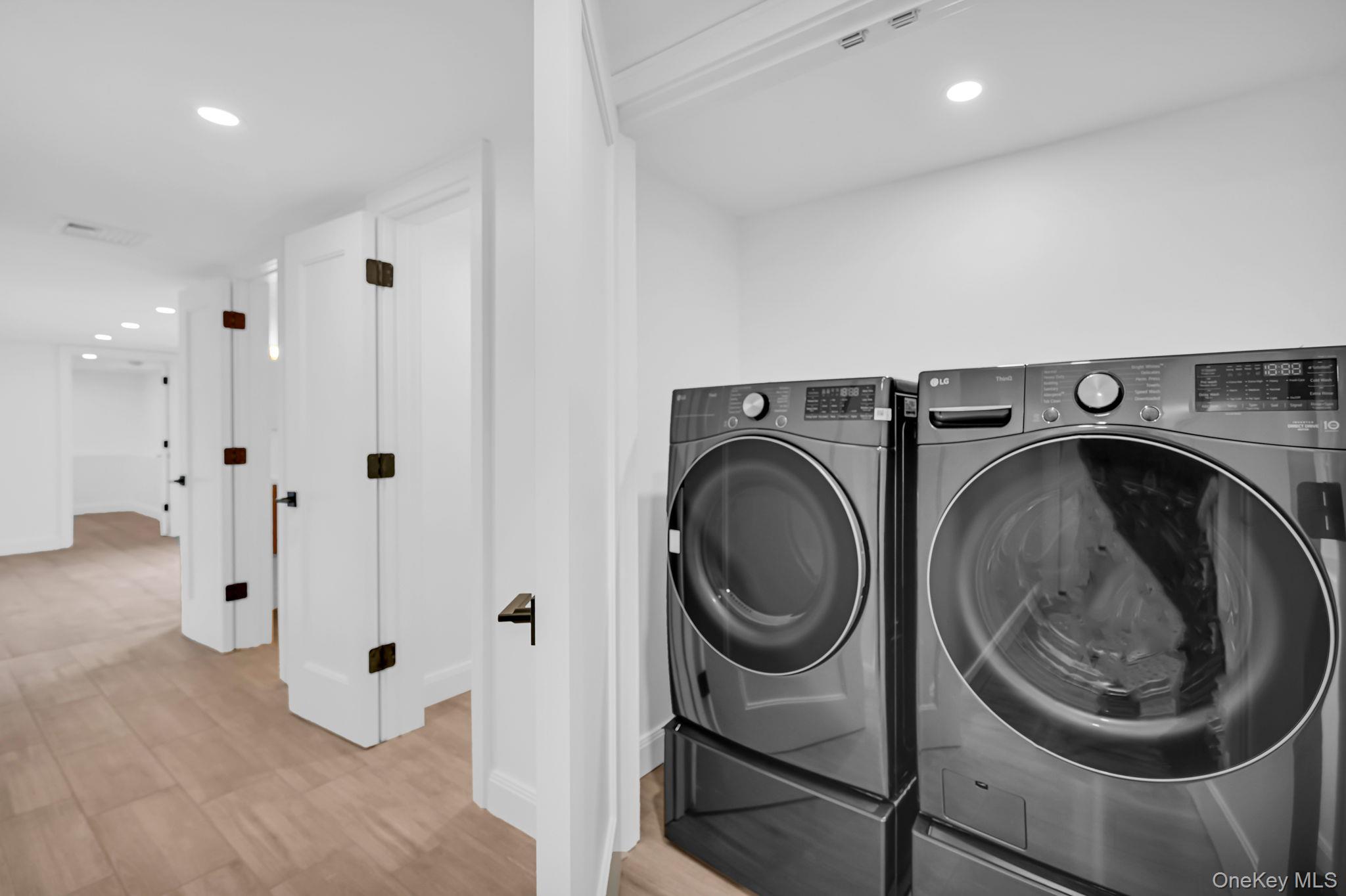 82 Seton Drive New Rochelle, NY 10804 - Photo 42 of 50 a view of a hallway with washer and dryer