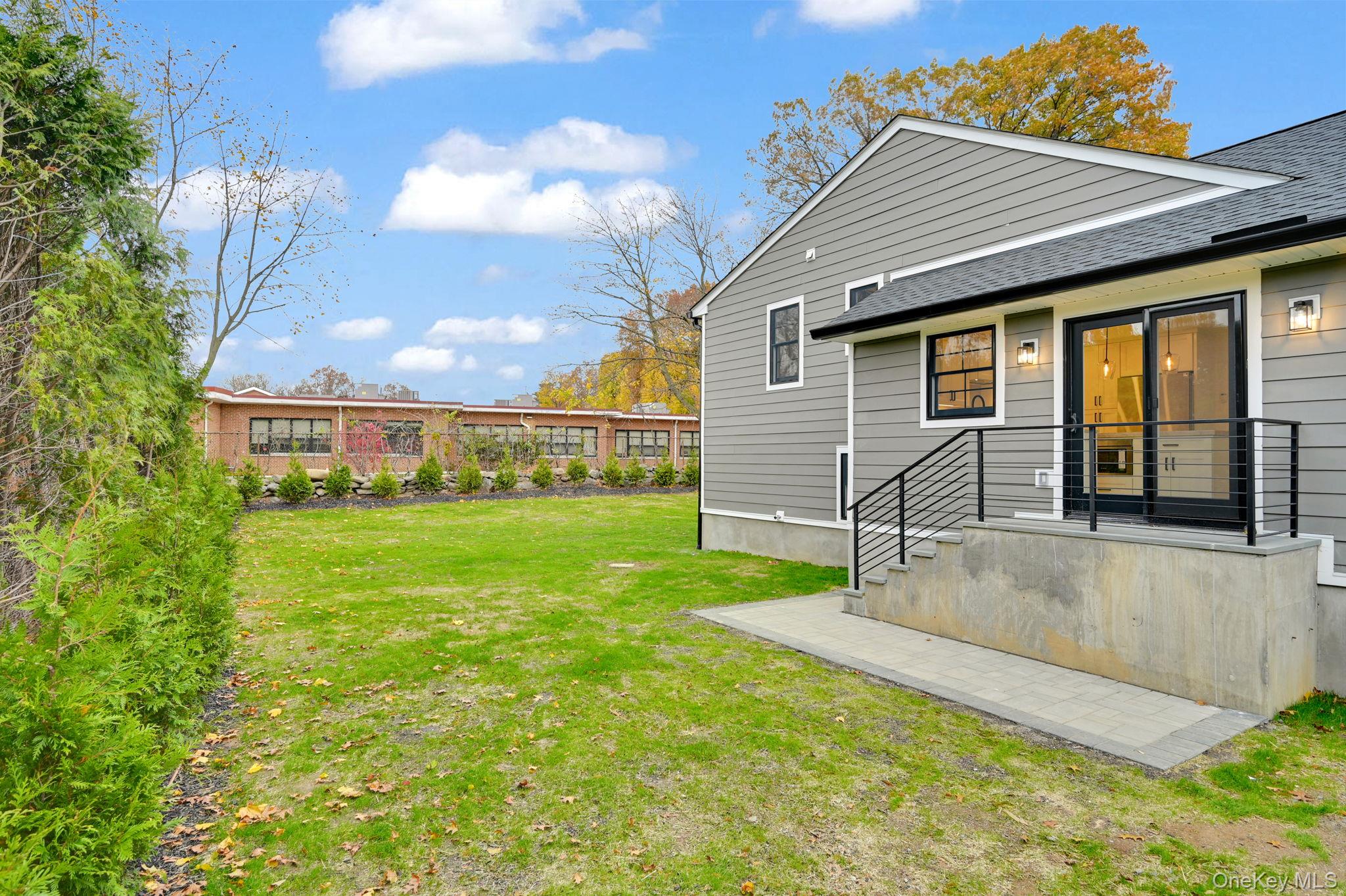 82 Seton Drive New Rochelle, NY 10804 - Photo 44 of 50 a view of a house with a yard