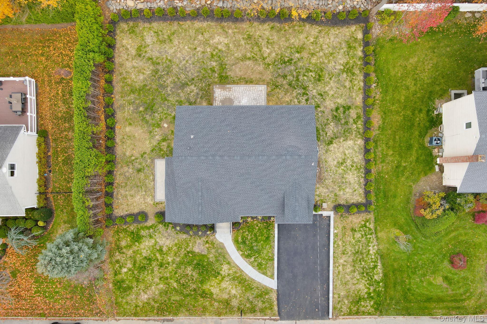 82 Seton Drive New Rochelle, NY 10804 - Photo 48 of 50 aerial view of a house with a yard and large trees