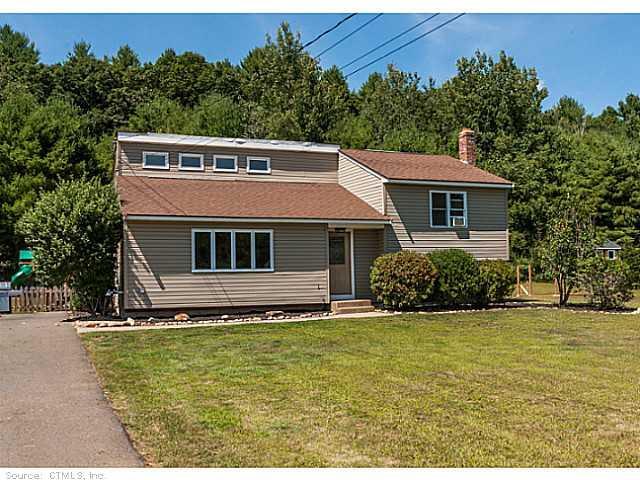 44 Fox Ridge Lane Tolland, CT 06084 - Photo 1 of 1 a view of a house with a yard