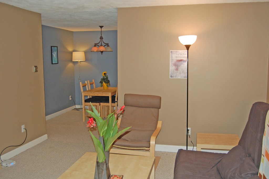 209 Great Road, Unit B5 Acton, MA 01720 - Photo 3 of 11 a view of a hallway with workspace