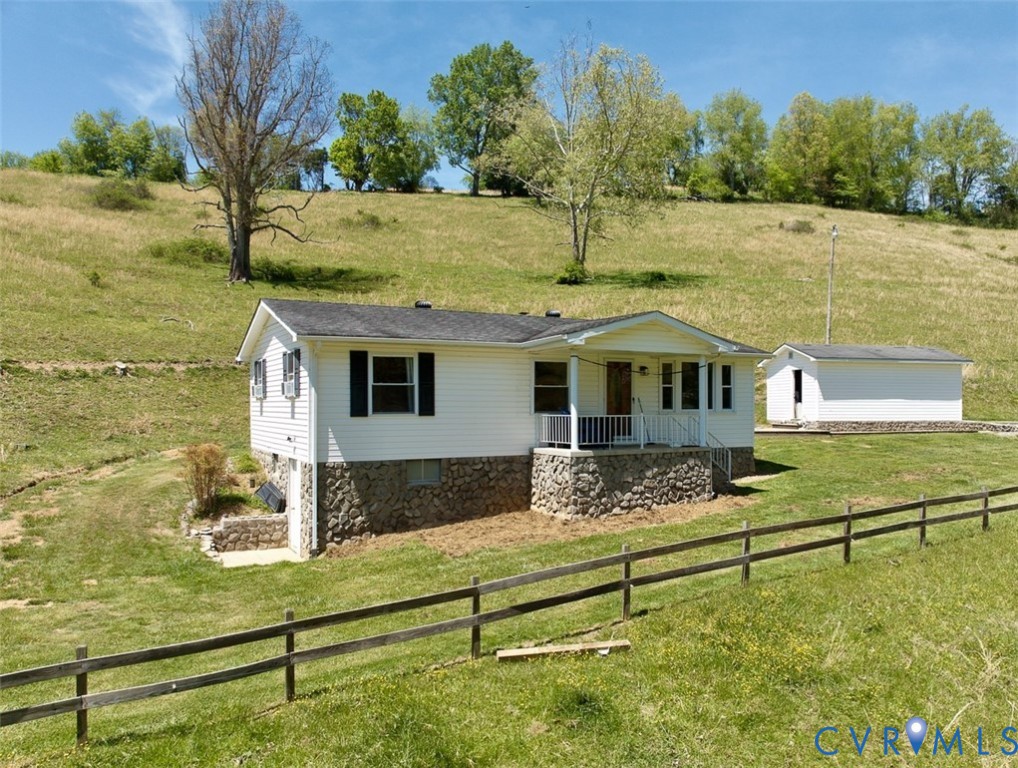 453 Long Hollow Road Cleveland, VA 24225 - Photo 5 of 50 a view of a house with a yard