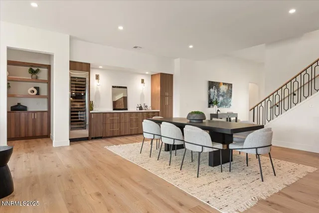 a utility room with sink dryer and washer