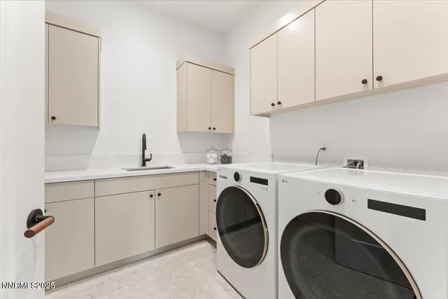 a view of a chairs and table on the garden