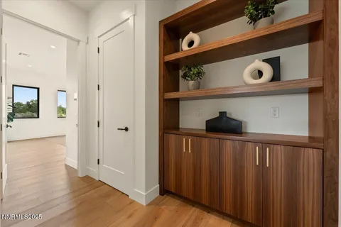 a bathroom with a sink a vanity and a mirror