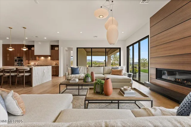 a view of an outdoor dining space with furniture and stove