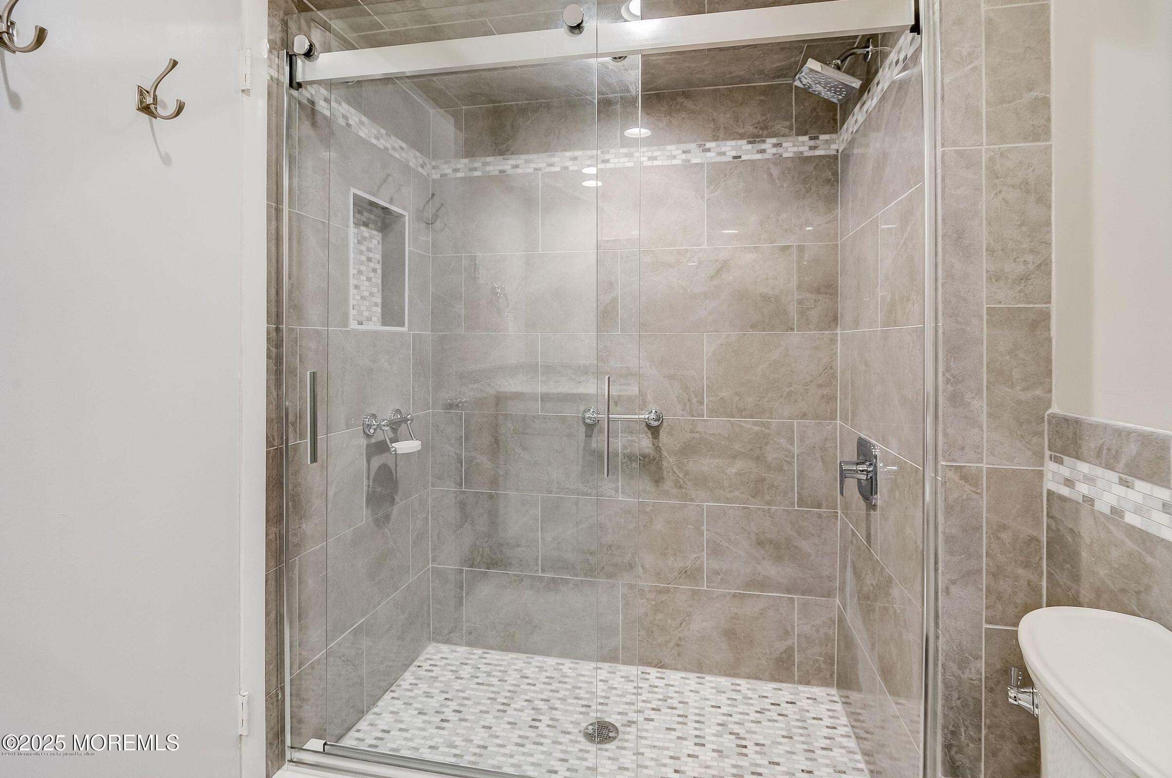 97 Arrowood Road, Unit K Manalapan, NJ 07726 - Photo 14 of 29 a bathroom with a shower