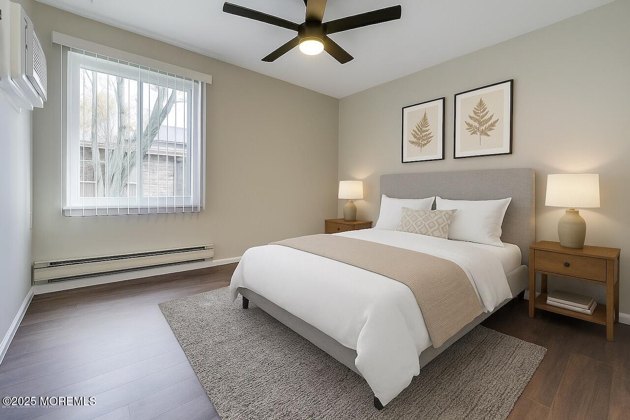 97 Arrowood Road, Unit K Manalapan, NJ 07726 - Photo 15 of 29 a bed room with a bed and a window