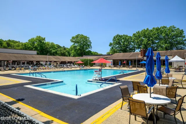 a view of an chairs and table in the terrace
