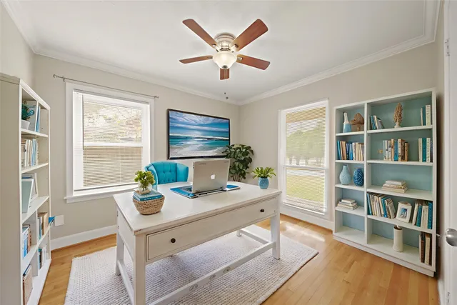 a workspace with furniture and a window