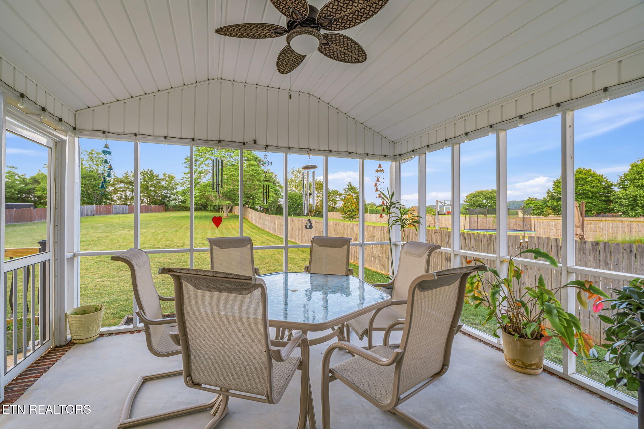 7030 Westerly Winds Road Knoxville, TN 37931 - Photo 13 of 40 a view of a dining room with furniture window and outside view