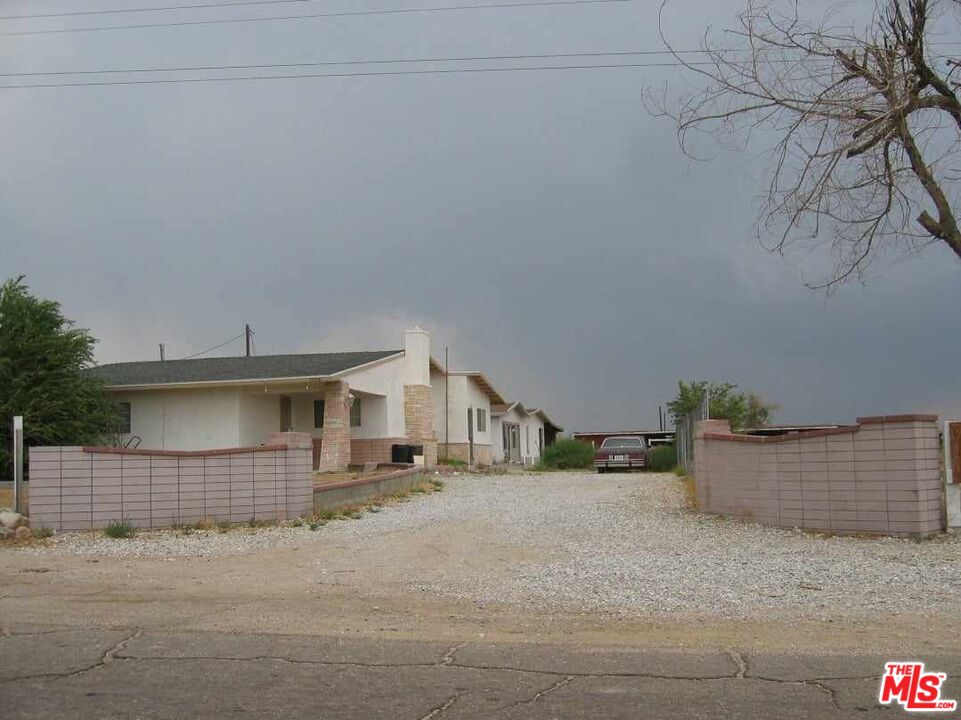 10316 Baker Road Lucerne Valley, CA 92356 - Photo 1 of 6 a view of street along with house and trees