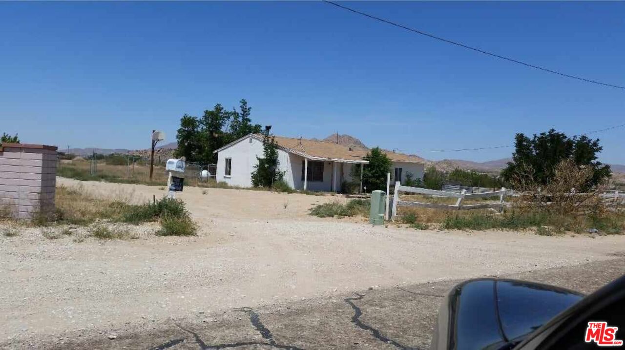 10316 Baker Road Lucerne Valley, CA 92356 - Photo 5 of 6 a house view with a lake view