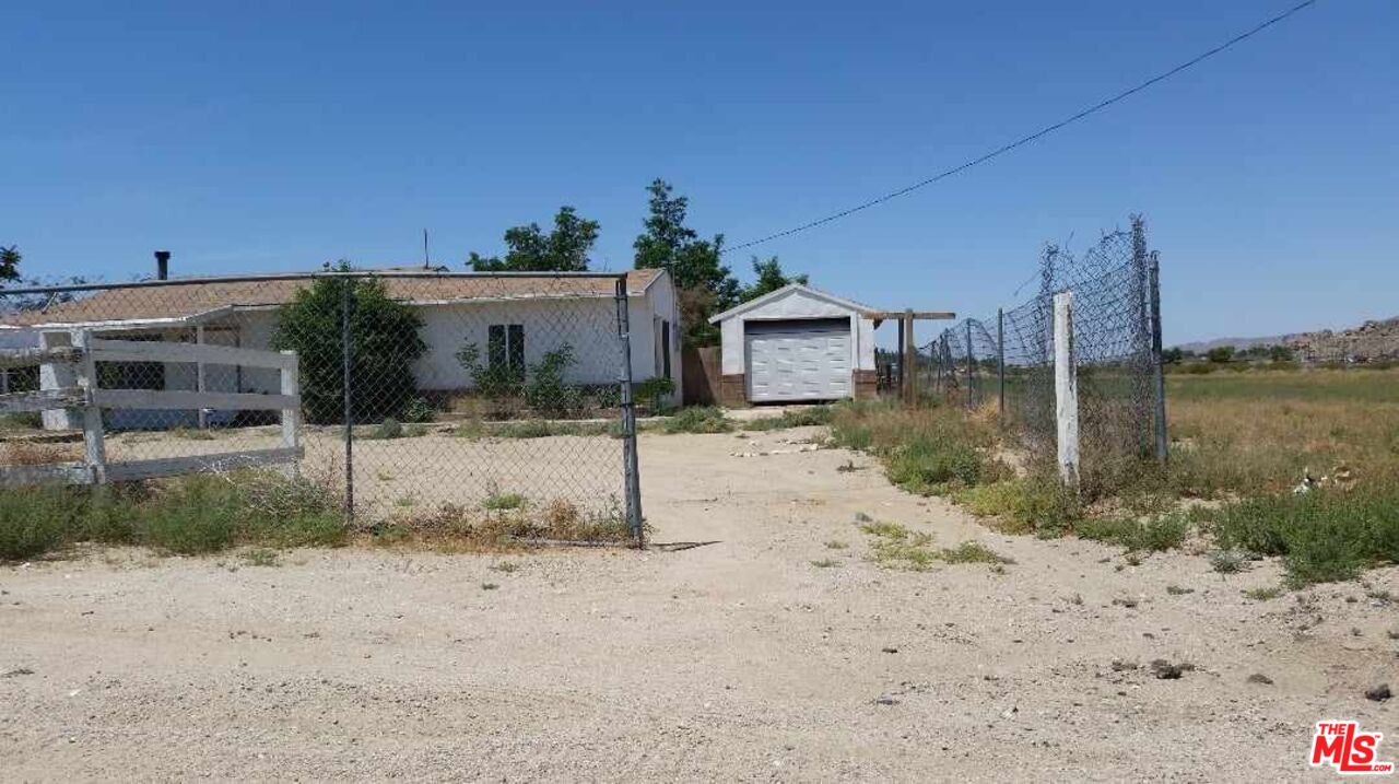 10316 Baker Road Lucerne Valley, CA 92356 - Photo 6 of 6 a view of a house with a yard