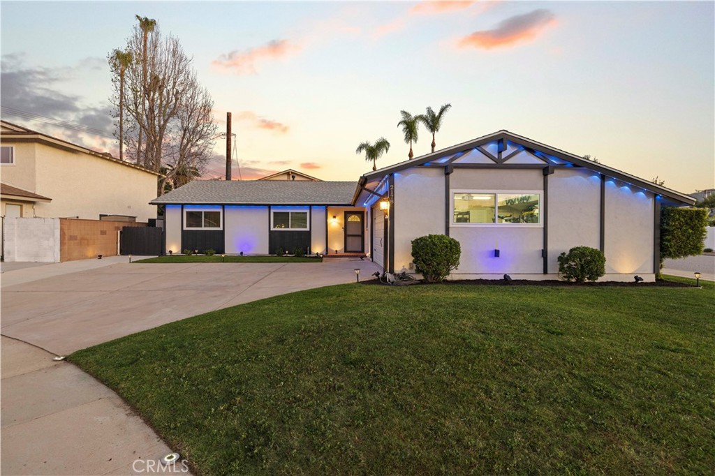 2178 Cheam Avenue Simi Valley, CA 93063 - Photo 1 of 1 a front view of a house with a yard and garage