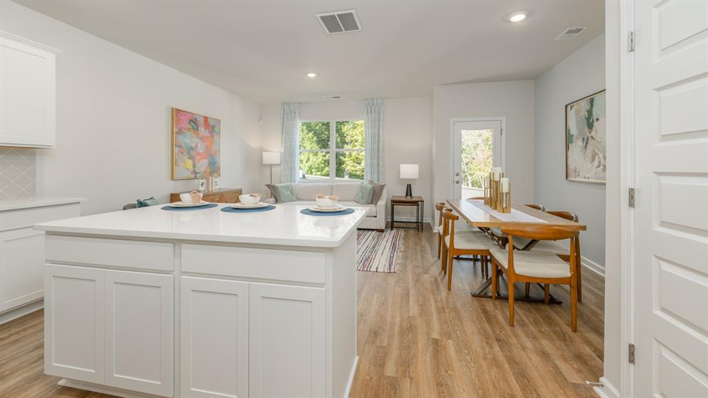 2086 Moss Hill Road Stone Mountain, GA 30083 - Photo 11 of 39 a living room with furniture and a wooden floor