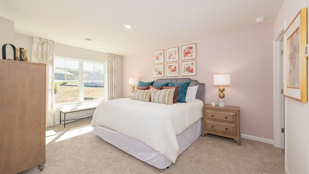 2086 Moss Hill Road Stone Mountain, GA 30083 - Photo 22 of 39 a bedroom with a bed and a window