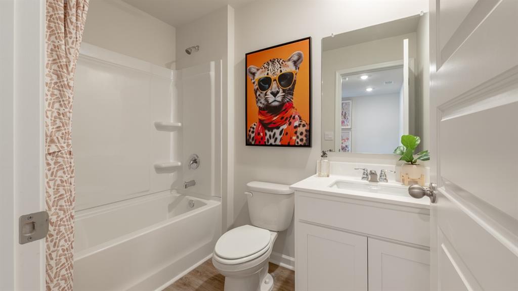 2086 Moss Hill Road Stone Mountain, GA 30083 - Photo 29 of 39 a bathroom with a sink a toilet and shower