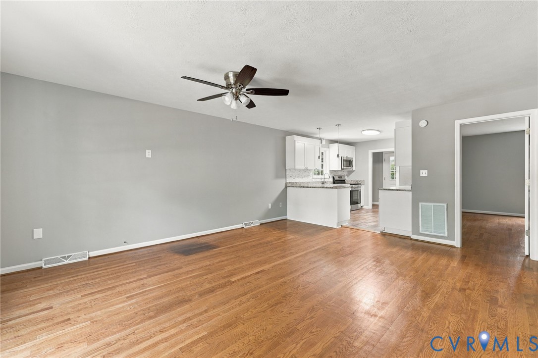 1626 Oak Ridge Road Appomattox, VA 24522 - Photo 10 of 30 Hardwood flooring, ceiling fan, white cabinetry, s