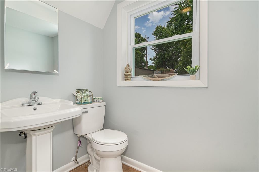2102 Castlerock Road Greensboro, NC 27406 - Photo 24 of 32 Basement Half bathroom/laundry room