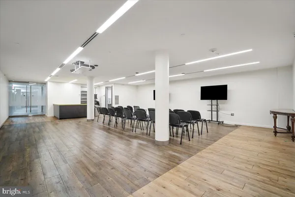 a sign board on the side of a road