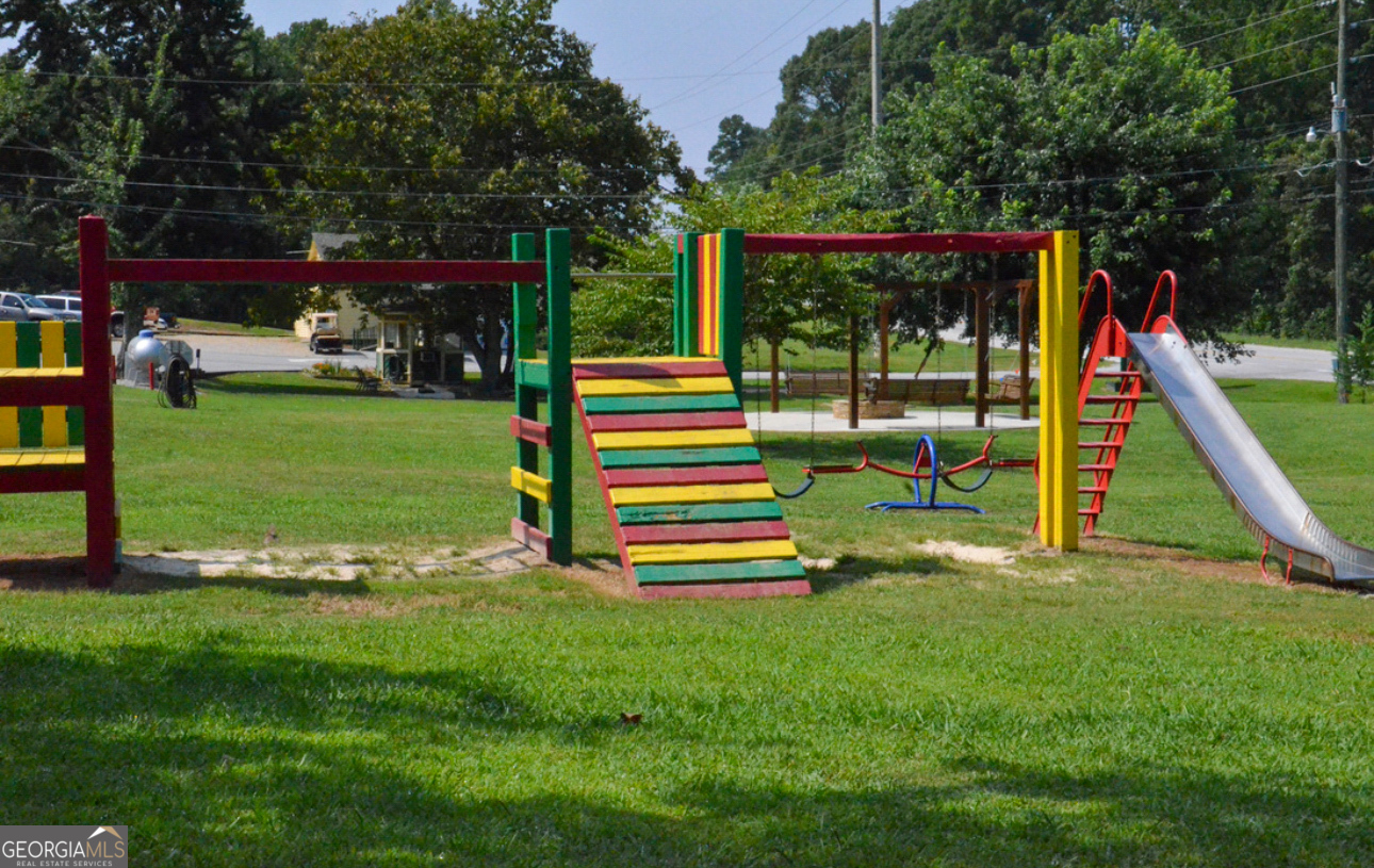 68 Nomad Trail Cleveland, GA 30528 - Photo 18 of 20 a view of a park with slide