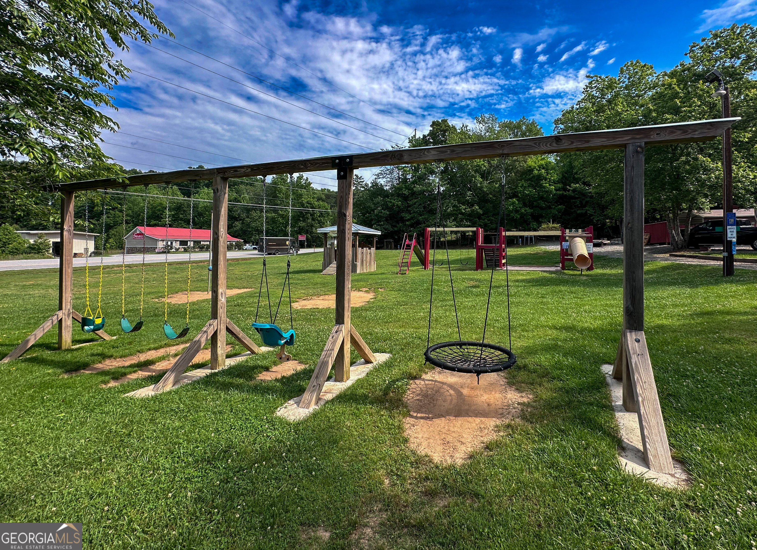 68 Nomad Trail Cleveland, GA 30528 - Photo 19 of 20 a view of a park with slide