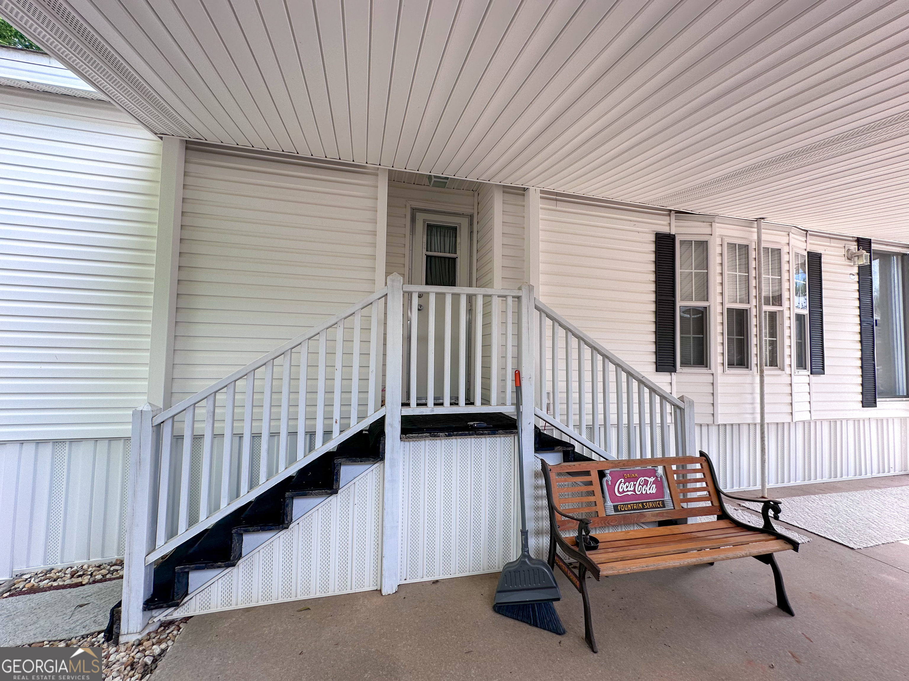 68 Nomad Trail Cleveland, GA 30528 - Photo 3 of 20 a view of a balcony with furniture