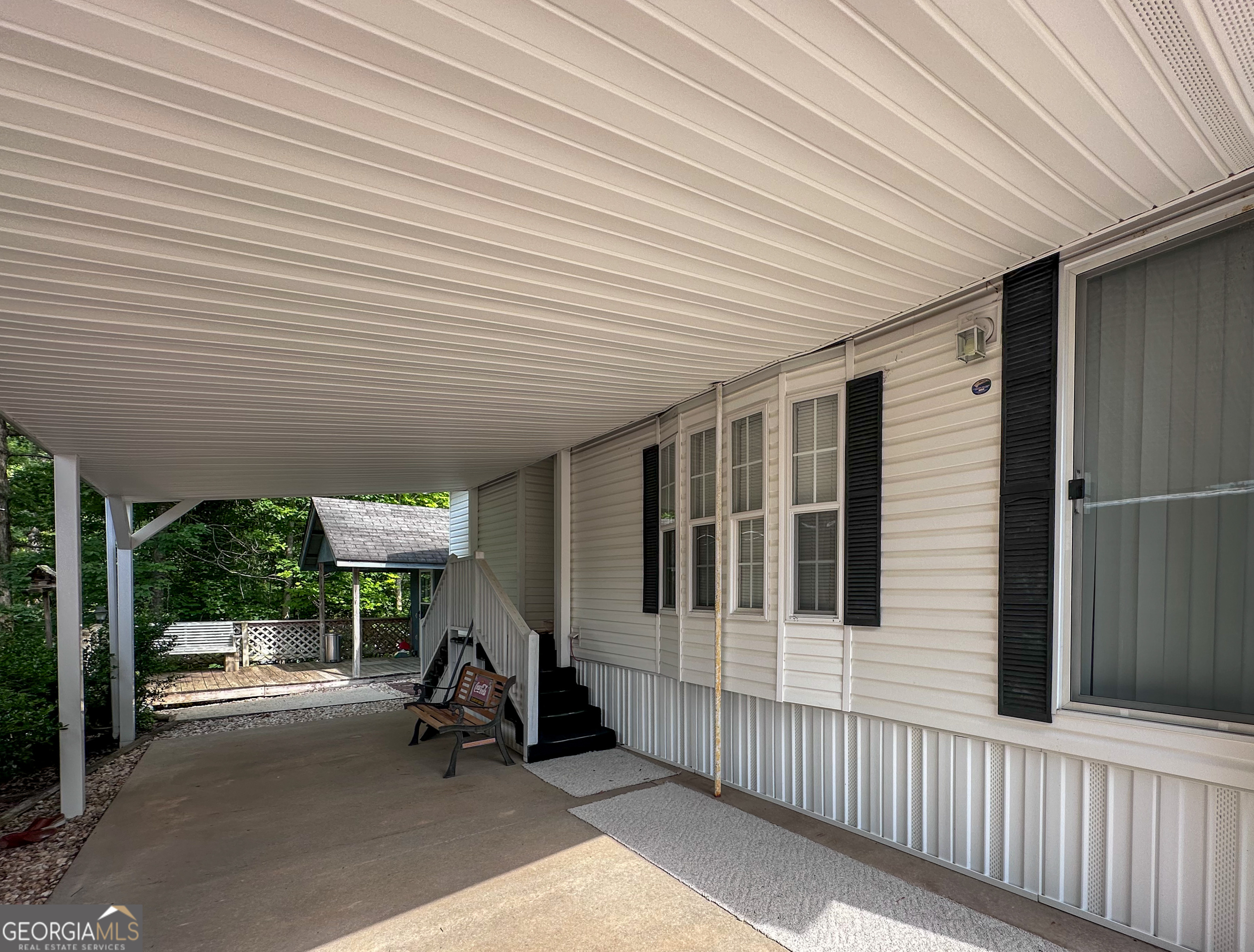 68 Nomad Trail Cleveland, GA 30528 - Photo 4 of 20 a view of a house with backyard and porch