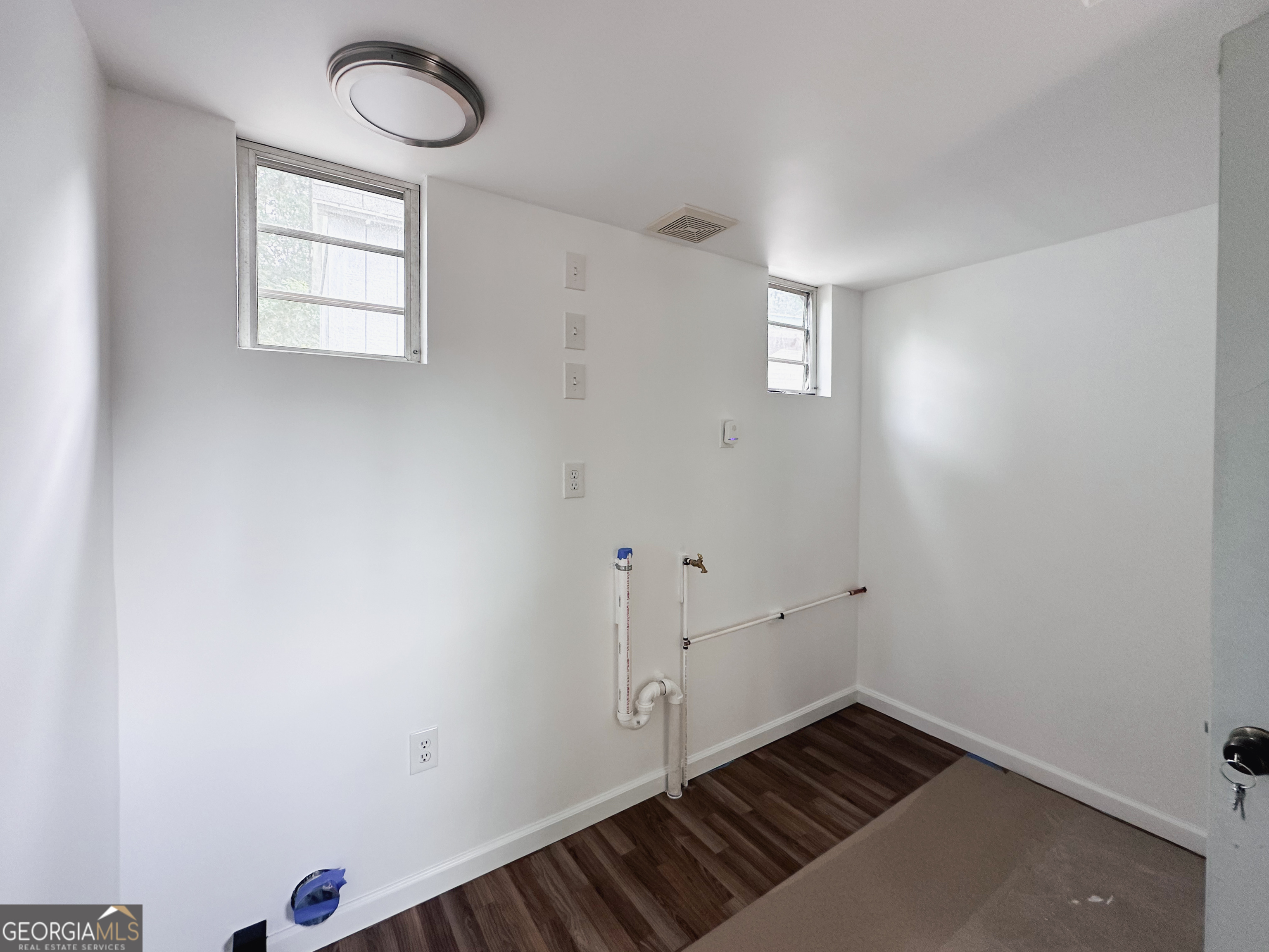 68 Nomad Trail Cleveland, GA 30528 - Photo 6 of 20 an empty room with windows