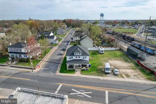 an aerial view of a houses with outdoor space