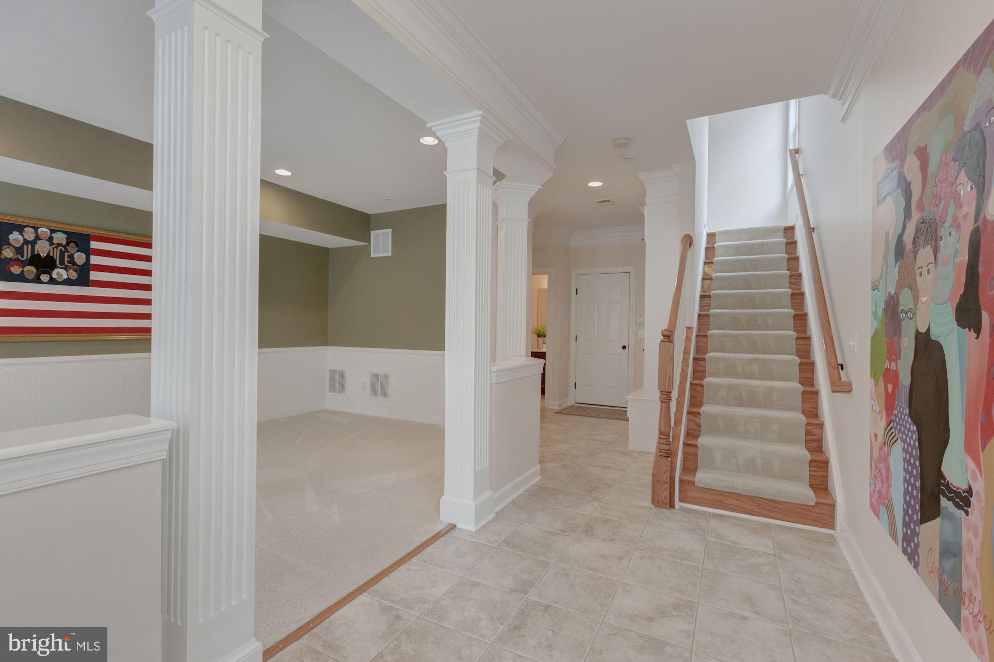 5146 Brawner Place Alexandria, VA 22304 - Photo 21 of 32 workspace with wooden floor and stairs