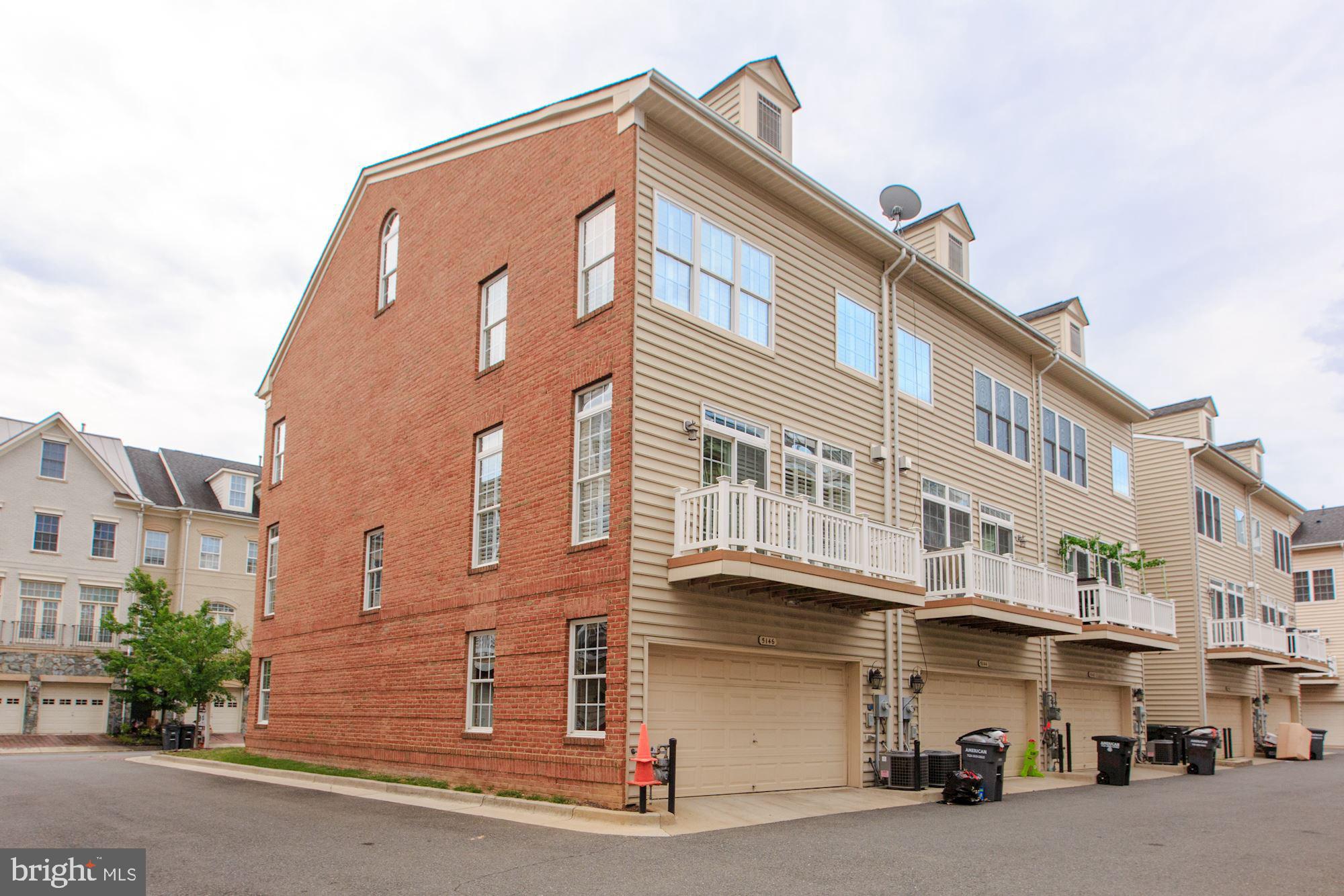 5146 Brawner Place Alexandria, VA 22304 - Photo 26 of 32 a large building with a small yard