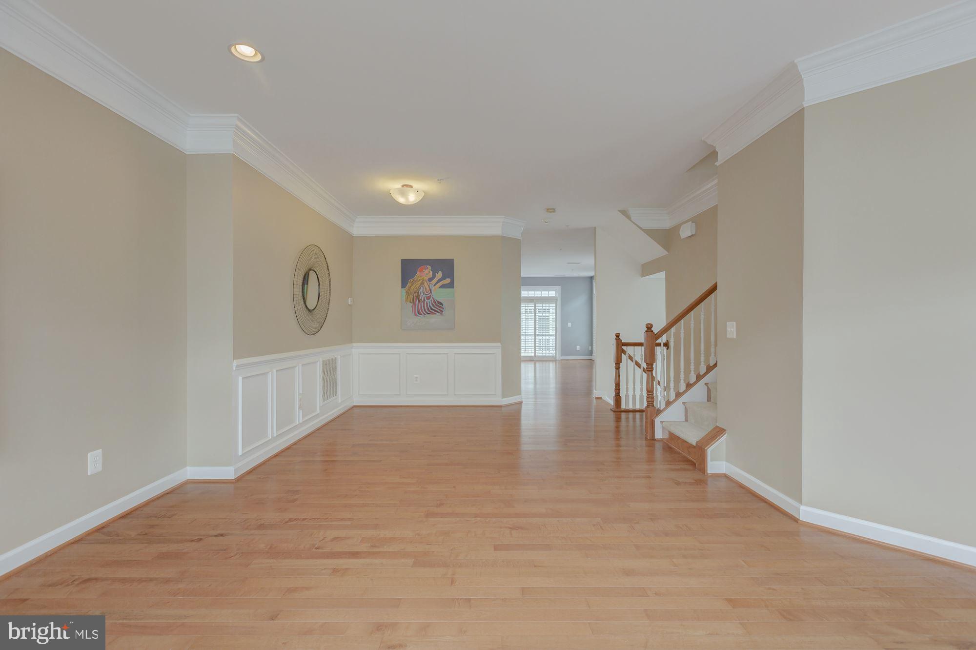 5146 Brawner Place Alexandria, VA 22304 - Photo 5 of 32 a view of an entryway with wooden floor