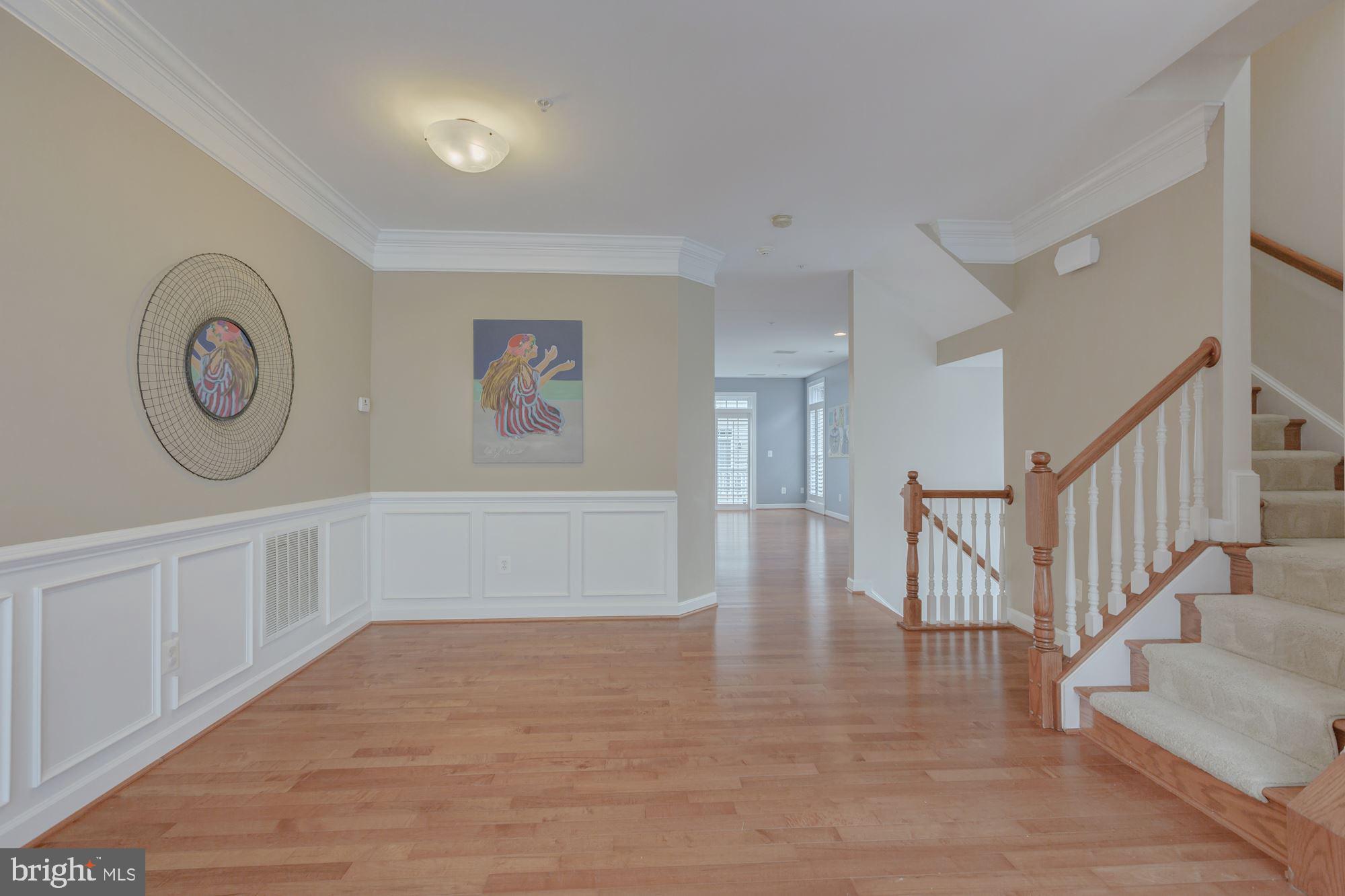 5146 Brawner Place Alexandria, VA 22304 - Photo 10 of 32 a view of an entryway with wooden floor